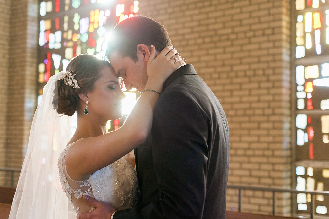 bride and groom embrace
