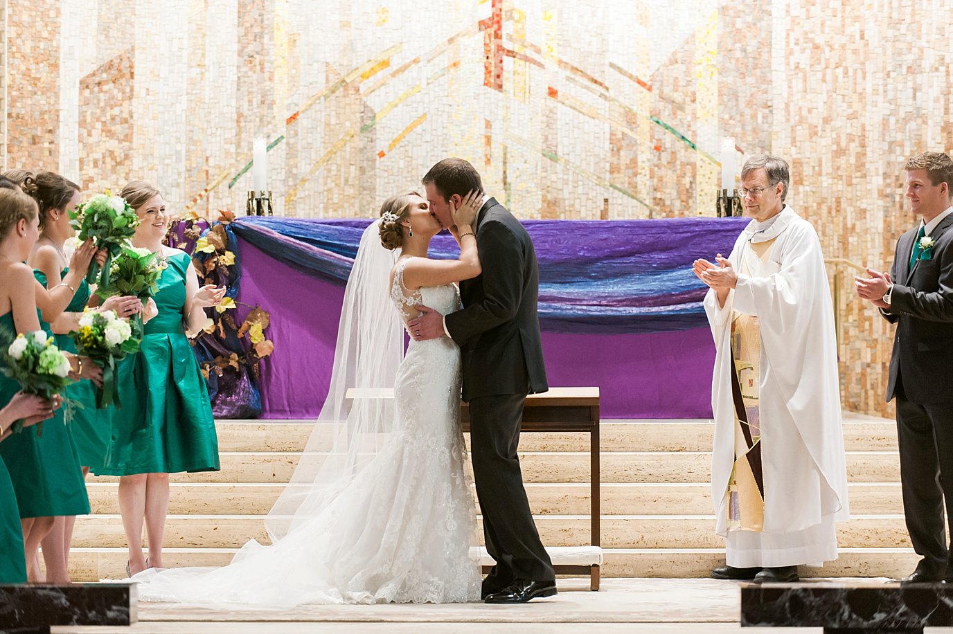 bride and groom kiss