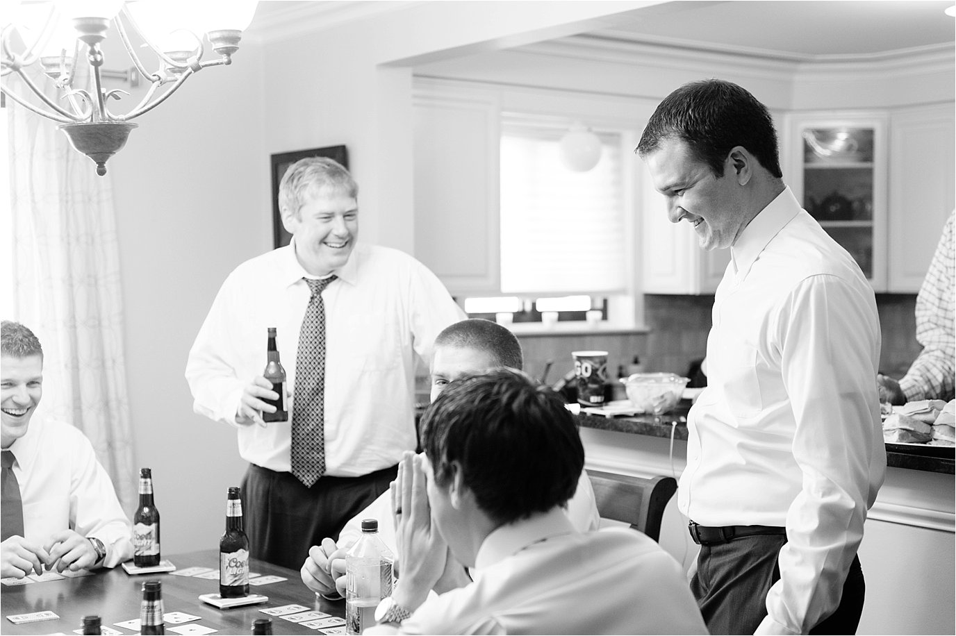 groom hanging out with groomsmen